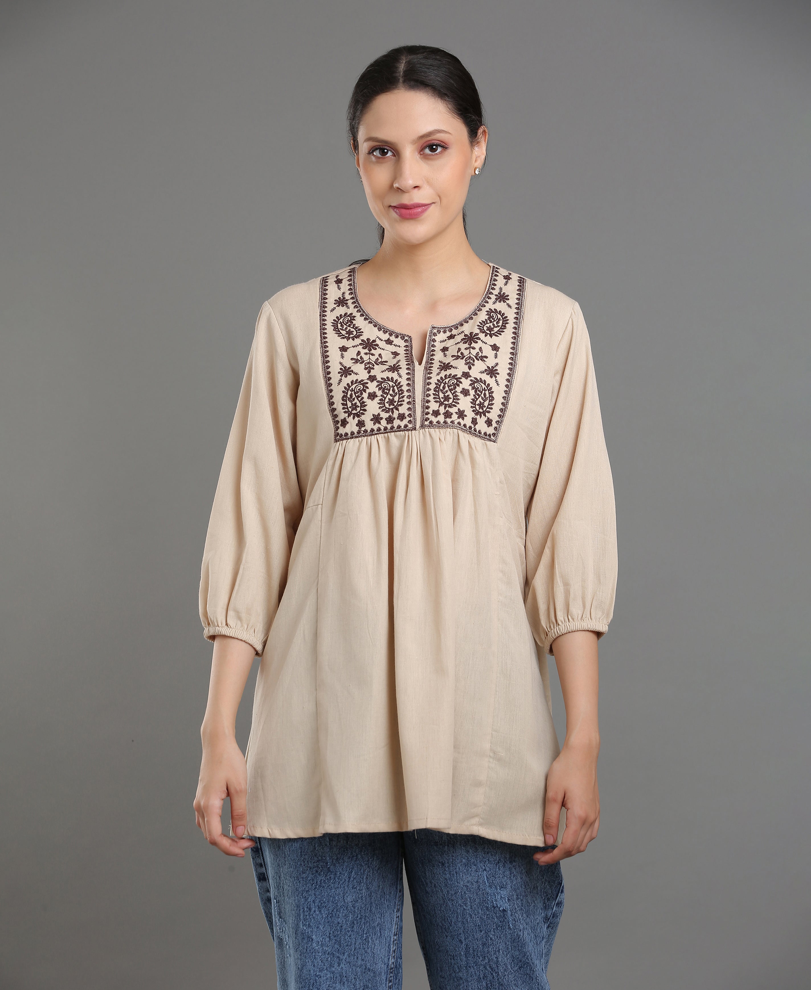 Cream Embroidered Peplum Top