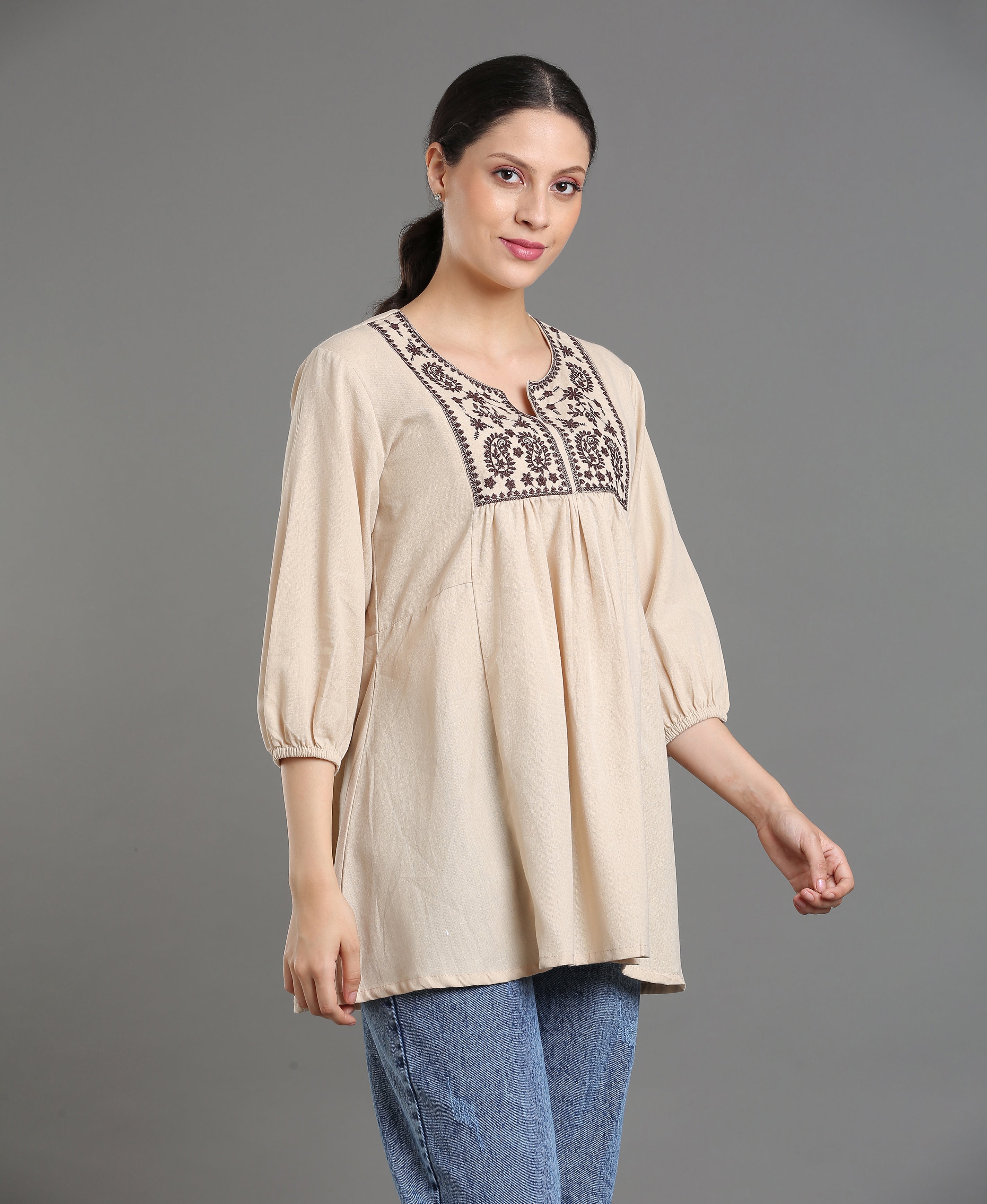 Cream Embroidered Peplum Top