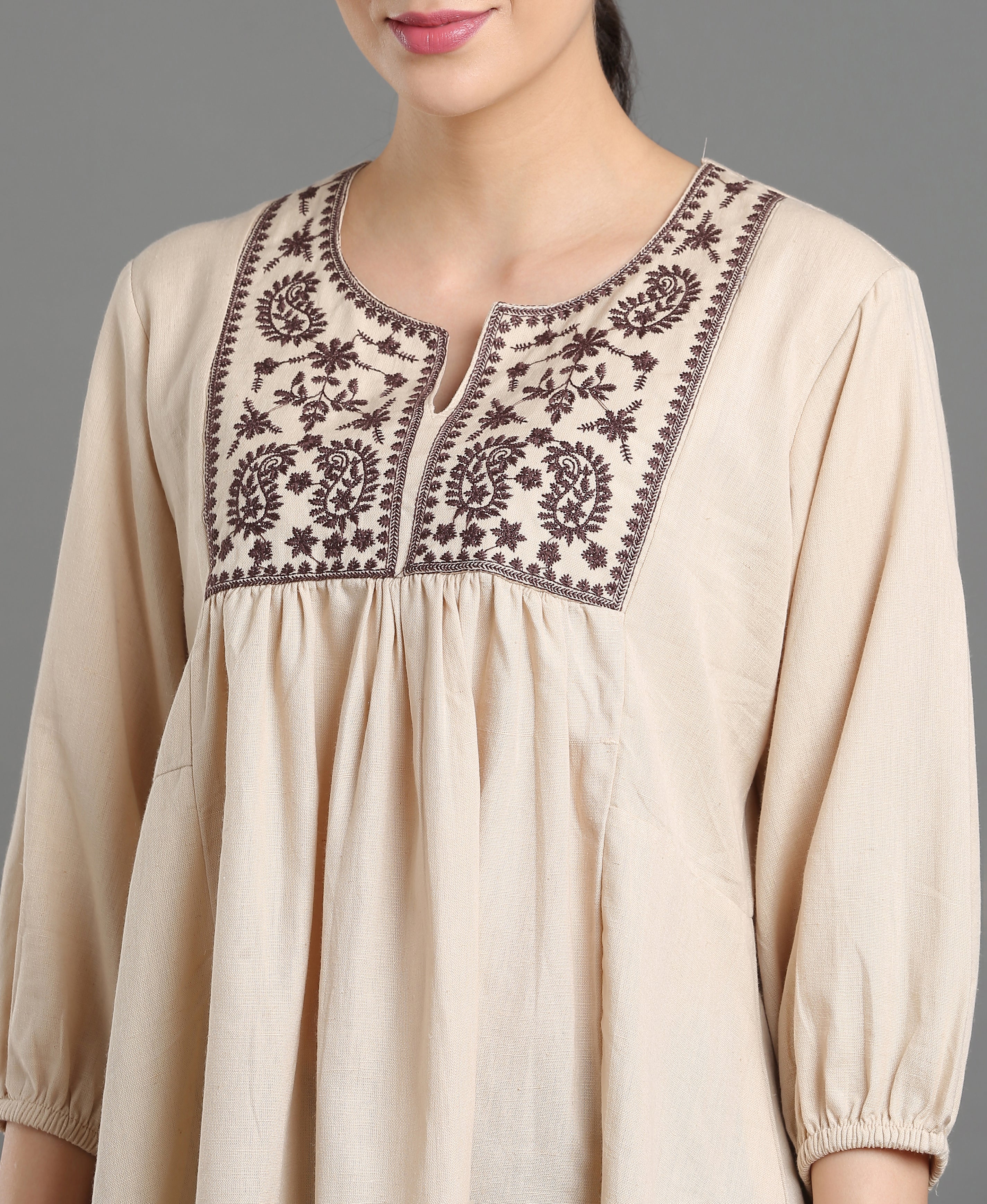 Cream Embroidered Peplum Top