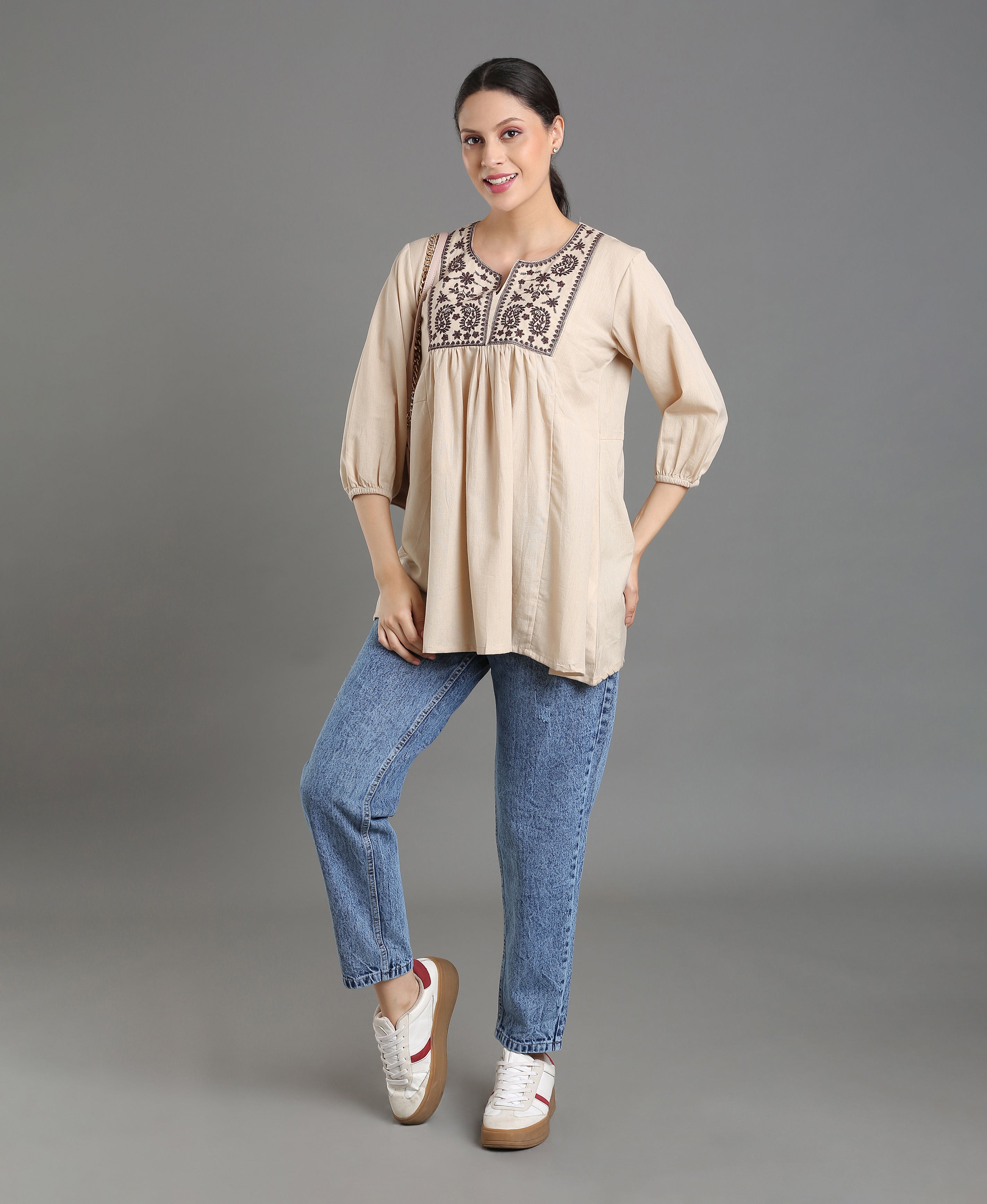 Cream Embroidered Peplum Top