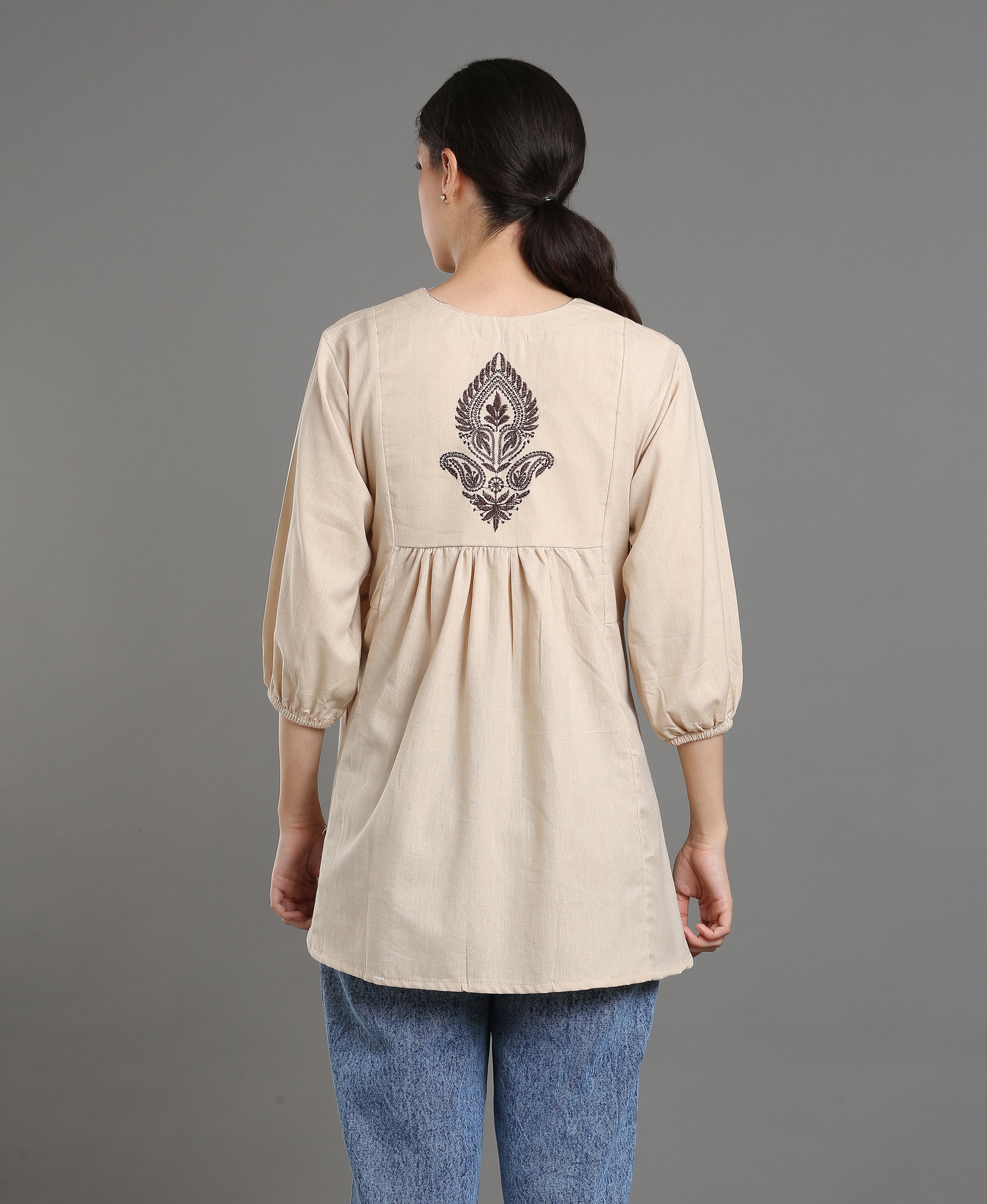 Cream Embroidered Peplum Top